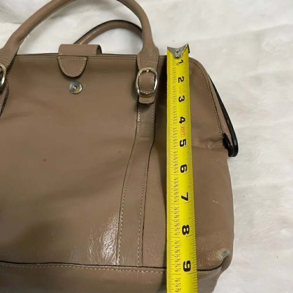 Tano Leather tan frame medium satchel gold tone hardwares .